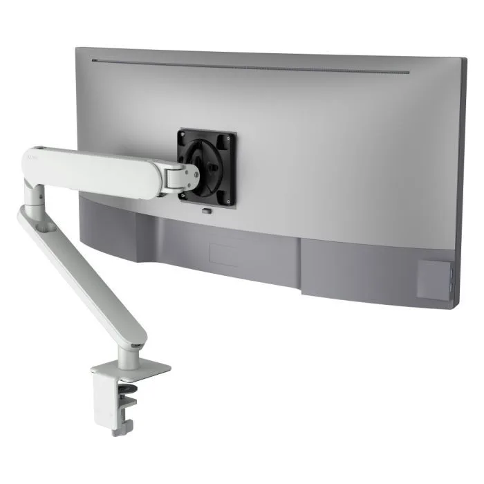 Atdec Ora dynamic monitor arm in white with an F-clamp, holding a monitor
