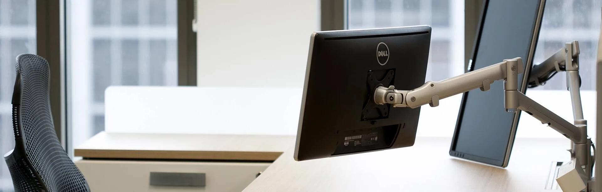 Activity-based workspace with monitor arms at DLA Piper in Sydney